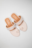 Kolhapuri style pearl adorned flats in beige and brown piping. The pearls are set in a way that depict stars